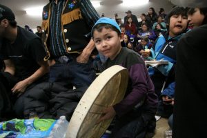 A young drummer supports his team. Photo by Levon Sevunts
