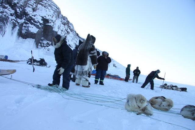Inuit hunters set up seal nets under the ice near Clyde River, Nunavut. Photo by Levon Sevunts.