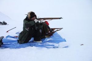 Canadian Rangers practice shooting their rifles. Photo by Levon Sevunts.
