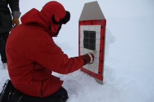 A Canadian Ranger counts his hits on the target. Photo by Levon Sevunts.