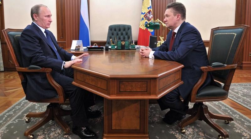 Russia's President Vladimir Putin (L) and Gazprom CEO, Alexei Miller, during a meeting on April 3, 2013. (Alexei Nikolsky, RIA-Novosti, AFP)