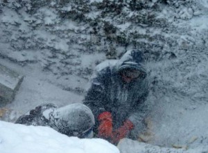 Crewmembers in Unalakleet work to thaw out sections of pipe from the main water line, which froze solid in March 2013. Residents have so far been without running drinking water for almost a month. (Courtesy Scott Dickens / Alaska Dispatch)