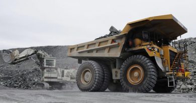 Miners work in the open pit mine at Agnico-Eagle's Meadowbank site in August 2011. The mine is situated 75 km north of Baker Lake, Nunavut. (The Canadian Press)