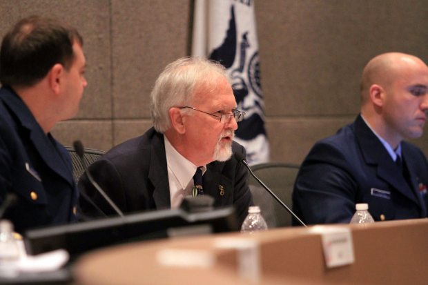Keith Fawcett, a civilian investigator with the Coast Guard, asks a question during a marine investigative hearing on the December grounding of the Shell oil rig Kulluk in Anchorage on Wednesday. At the left is Coast Guard Cmdr. Joshua McTaggart, who is heading the investigation. (Pool photographer / Mark Thiessen / AP)