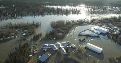 Homes and other buildings shown flooded in Galena, Alaska in 2013. (Ed Plumb / National Weather Service / AP)