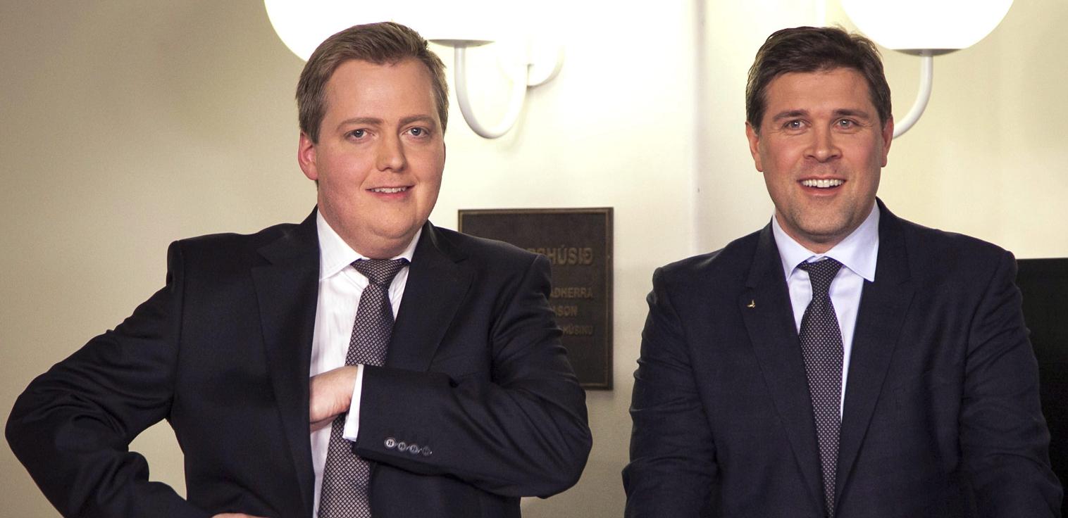 Chairman of the Progressive Party Sigmundur David Gunnlaugsson, left, and Independence leader Party Bjarni Benediktsson pose together following general elections on Saturday, April 27, 2013, in Reykjavik, Iceland. (Brynjar Gauti / AP)