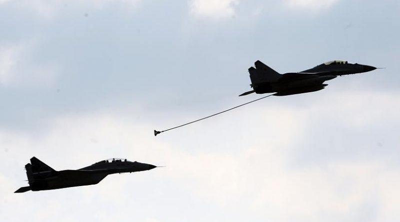 MiG-35d military planes perform in Moscow, on August 16, 2011. A new Swedish report highlights concerns about Russia's political direction. (Dmitry Kostyukov / AFP PHOTO)