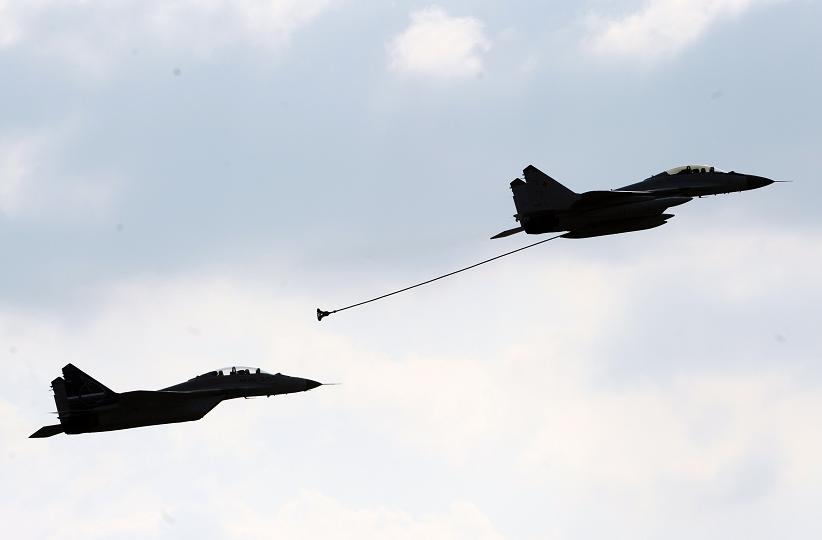 MiG-35d military planes perform in Moscow, on August 16, 2011. A new Swedish report highlights concerns about Russia's political direction. (Dmitry Kostyukov / AFP PHOTO)