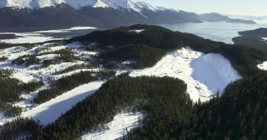 In this Feb. 1, 2007 picture, snow covers Lower Slate Lake, right, in the Tongass National Forest. (Michael Penn / The Juneau Empire / AP Photo )