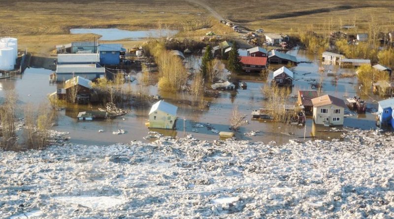 Homes and other buildings are shown flooded in Galena, Alaska. (Ed Plumb, National Weather Service, AP)