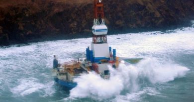 Waves crash over the mobile offshore drilling unit Kulluk where it sits aground on the southeast side of Sitkalidak Island, Alaska, Jan. 1, 2013. (US Coast Guard photo)