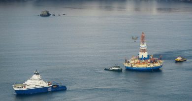 The drilling unit Kulluk, towed by the anchor-handling vessel Aiviq, heads to its safe harbor location in Kiliuda Bay. (Courtesy Shell, Alaska Dispatch)