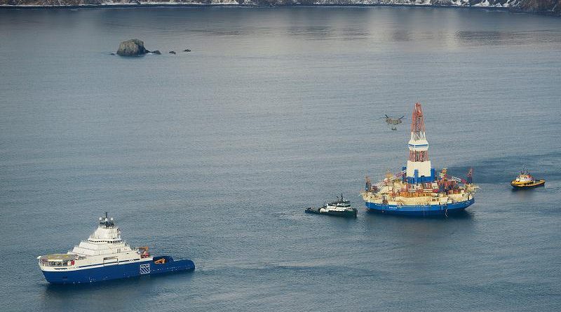The drilling unit Kulluk, towed by the anchor-handling vessel Aiviq, heads to its safe harbor location in Kiliuda Bay. (Courtesy Shell, Alaska Dispatch)