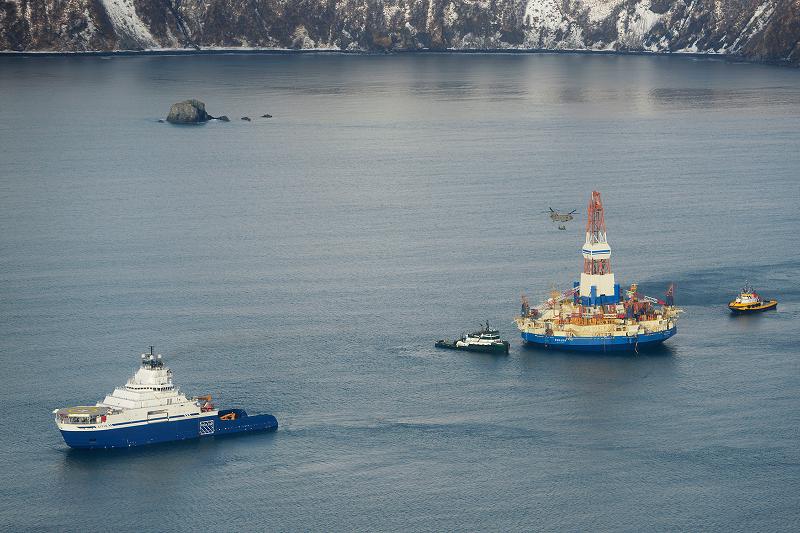 The drilling unit Kulluk, towed by the anchor-handling vessel Aiviq, heads to its safe harbor location in Kiliuda Bay. (Courtesy Shell, Alaska Dispatch)