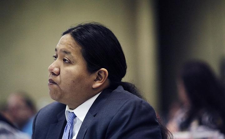 Rep. Kevin Killer listens to testimony during the Indian Child Welfare Act summit Wednesday, May 15, 2013 in South Dakota. (Benjamin Brayfield / Rapid City Journal / AP)