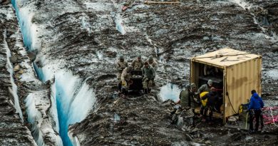 Military personnel recovering the remains of a C-124 air plane that crashed on Colony glacier in 1952. July 12, 2012 (Loren Homes / Alaska Dispatch)