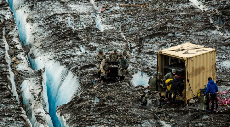 Military personnel recovering the remains of a C-124 air plane that crashed on Colony glacier in 1952. July 12, 2012 (Loren Homes / Alaska Dispatch)