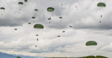 Soldiers from the Army's 4th Brigade, 25th Infantry Division participate in operation Spartan Reach at JBER's Malemute Drop Zone on June 4, 2013. The operation is designed to simulate parachuting behind enemy lines and securing a hostile airfield. (Loren Holmes, Alaska Dispatch)