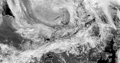 A cyclone (top centre) forms over the Canadian Arctic in an Environment Canada NOAA satellite imagery taken at 15:42 Eastern time on Thursday July 25, 2013. (The Canadian Press)