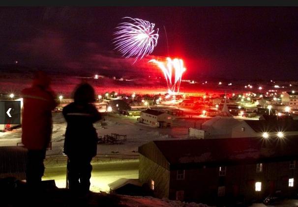 Fireworks lit up the night sky just after midnight over Iqaluit on Friday, April.1, 1999. ( Kevin Frayer / The Canadian Press)
