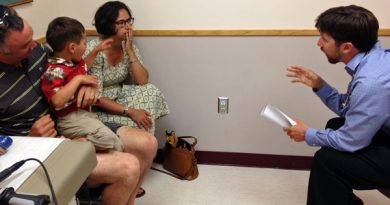 Pediatric Resident Dr. Eric Foote meets with a family at LaTouche Pediatrics in Anchorage. (Annie Feidt / APRN – Anchorage)