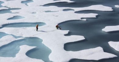 A team from NASA collects water for research projects from Arctic ice floes. (Kathryn Hansen / NASA photo / Alaska Dispatch)