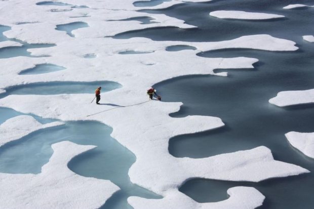 A team from NASA collects water for research projects from Arctic ice floes. (Kathryn Hansen / NASA photo / Alaska Dispatch)