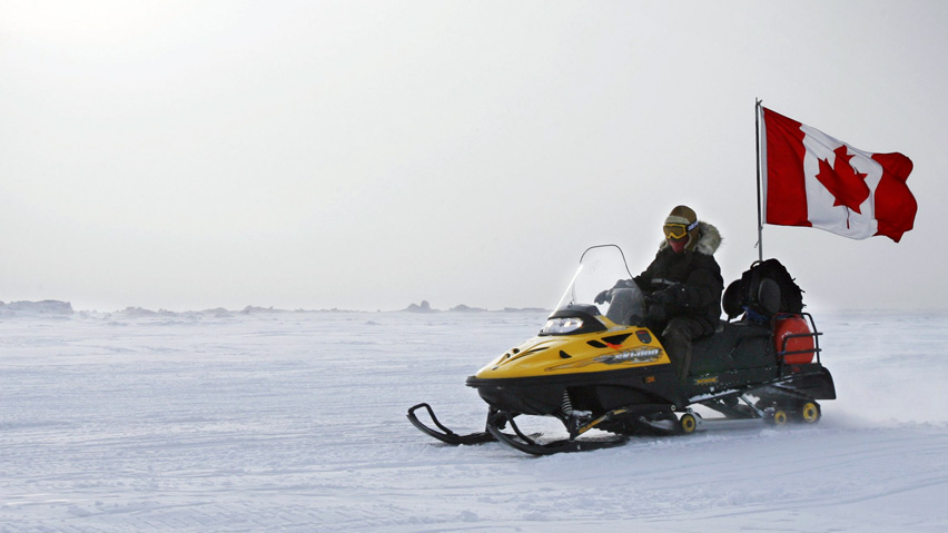 Ranger Joe Amarualik, from Iqaluit, Nu., drives his snowmobile on the ice during a Canadian Ranger sovereignty patrol near Eureka, on Ellesmere Island, Nunavut, Saturday, March 31, 2007. The patrol involving personnel from the Canadian Forces, the RCMP and Inuit Canadian Rangers are travelling over 8000 km helping maintain a military presence in the Canadian arctic.(CP PHOTO/Jeff McIntosh) Canada
