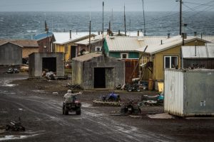 A boy plays with a toy gun in Savoonga. August 30, 2012. (Loren Holmes / Alaska Dispatch)