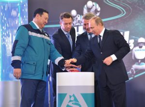 Novatek chairman of the board Leonid Mikhelson (2nd R) on October 15, 2013. Novatek, Russia's largest gas independent, agreed to supply 3 million tonnes per year of LNG to CNPC, one of the partners in its $20 billion project on the Arctic Yamal peninsula (AFP)