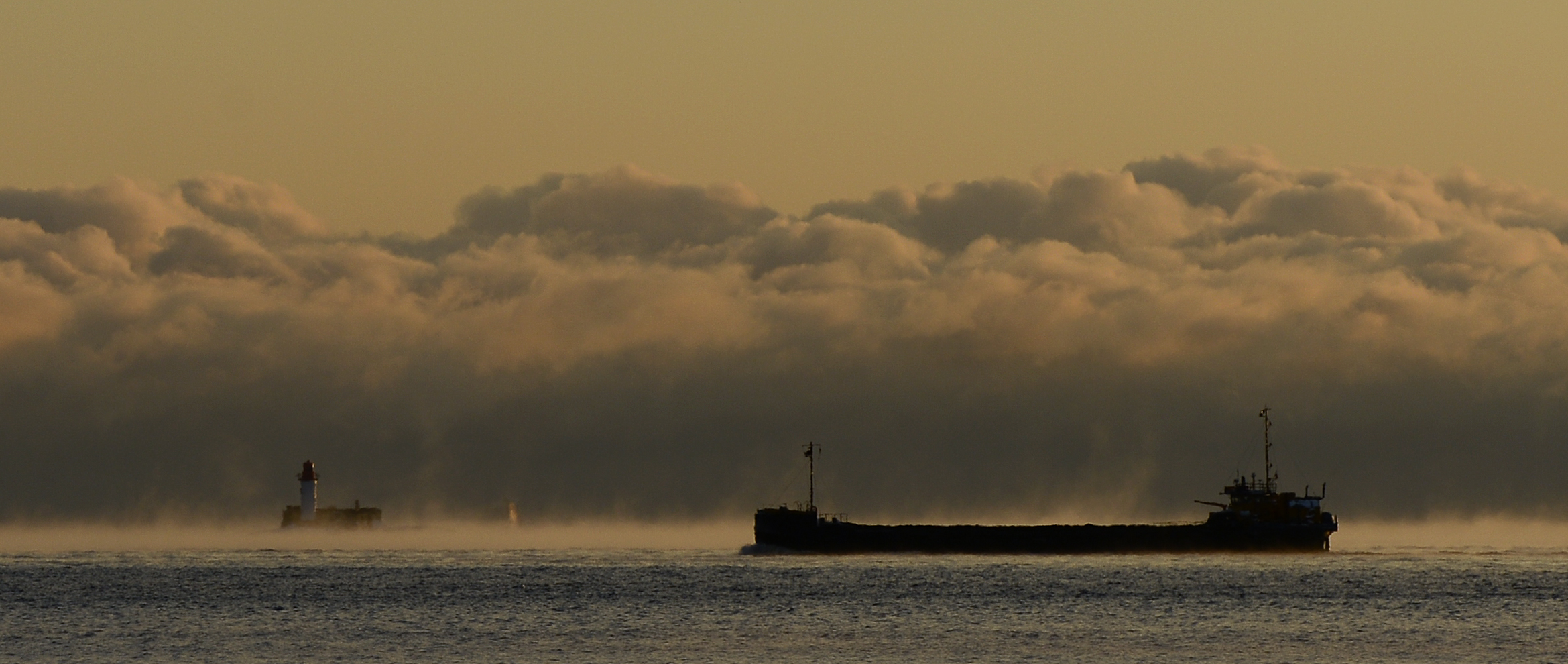 A ship makes it ways through heavy morning fog towards the Baltic Sea outside the northern Swedish city of Sundsvall on November 3, 2012.  A 50 per cent increase in Baltic shipping is expected within the next 30 years. (Jonathan Nackstrand / AFP)