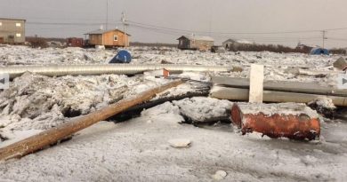 Ice buildup from flooding in the community of Kotlik. Nov. 11, 2013. (Patricia Okitkun / courtesy Alaska Dispatch)