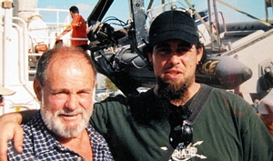 Raymond Paul with his son Alexandre in Montreal's port. (Courtesy Paul family)