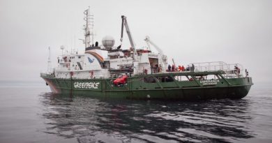 Greenpeace crew launch a two-seater submarine, on loan from the Waitt Insititute, to explore the Chukchi Sea floor near a proposed Shell drill site north of Point Hope, Alaska, in July 2012. (Greenpeace)