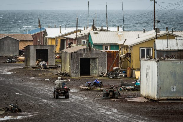 A boy rides a four-wheeler through the rural Alaska community of Savoonga on Saint Lawrence Island in the Bering Sea. (Loren Holmes / Alaska Dispatch)