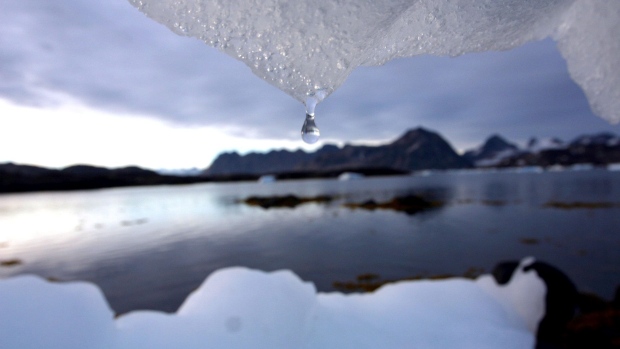 In Nunavut, iceberg water is considered the best drinking water, and elders say it makes the best tea. That's why people in Pond Inlet didn't decorate an iceberg with Christmas lights this year. (The Associated Press)