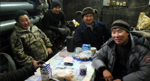 Russian journalist Bolot Bochkarev spent some time with Mikhail and his three sons, Danil, Djulustan and Pavel (from left to right), all truckers who travel the Kolyma all-weather road, and the seasonal ice roads that reach into the most remote parts of Siberia. (Bolot Bochkarev)