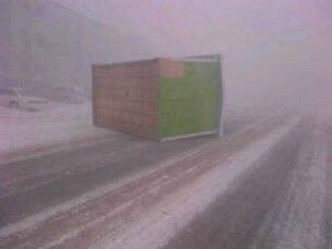 A shed from outside the Ivavik apartment building near the Quickstop slides down Iqaluit's Apex Road. The City of Iqaluit endured wind gusts up to 141 km/h yesterday. (Nauyavik Dennis )
