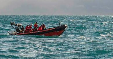 Parks Canada underwater archeologists ride the waves in their northern survey area west of King William Island during this year's search for the lost vessels of Sir John Franklin's doomed 1845 polar expedition. (Louis Barnes/Parks Canada)