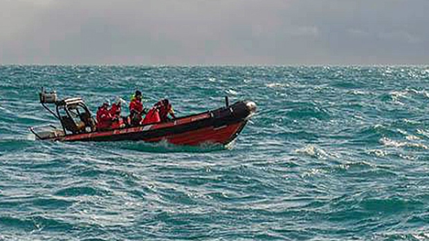 Parks Canada underwater archeologists ride the waves in their northern survey area west of King William Island during this year's search for the lost vessels of Sir John Franklin's doomed 1845 polar expedition. (Louis Barnes/Parks Canada)