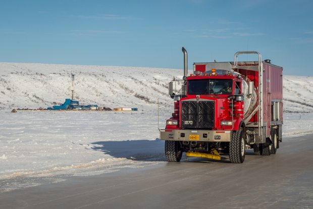 A Cruz Construction mechanics' truck leaves an exploration rig in Umiat, Alaska, via an ice road on March 8, 2013. (Courtesy Stephen Nowers / Cruz Construction / Alaska Dispatch)