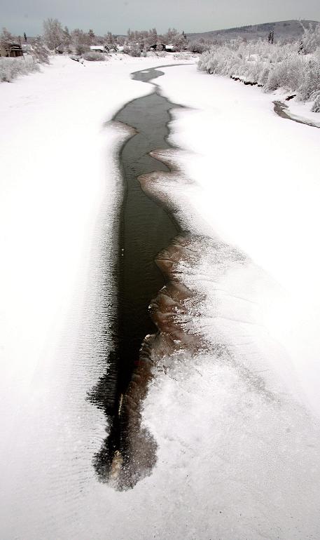 Body of water near Fairbanks, Alaska. Further north in Alaska's Arctic, researchers have found that lake ice is getting thinner as the climate warms. (Eric Engman / The Fairbanks Daily News-Miner / AP)