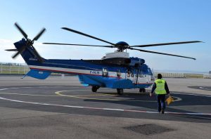 A man walks to an Eurocopter's EC225 helicopter. ( Gerard Julien / AFP)