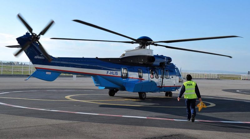 A man walks to an Eurocopter's EC225 helicopter. ( Gerard Julien / AFP)