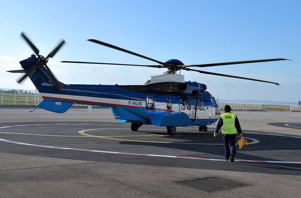 A man walks to an Eurocopter's EC225 helicopter. ( Gerard Julien / AFP)