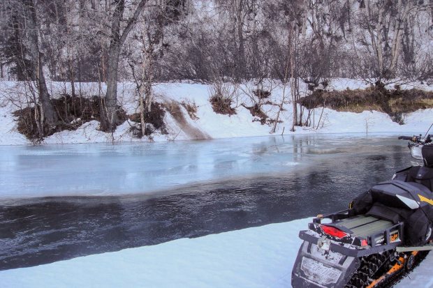 The Happy River portion of the Iditarod Trail was open in early February. The trail is visible on the far side of the bank, a dirty path up the bank. (Courtesy Howard Sevey / Alaska Dispatch)