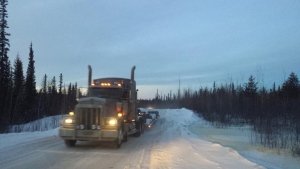 A large truck drives the Sahtu winter road. (Joanne Stassen/CBC)