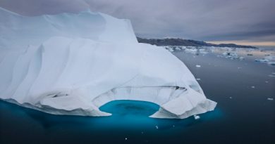 An iceberg melts off the coast of Ammasalik, Greenland. (The Associated Press)