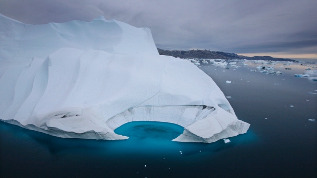 An iceberg melts off the coast of Ammasalik, Greenland. (The Associated Press)