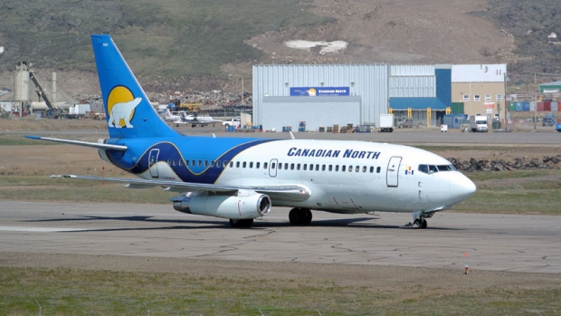 A Canadian North 737 taxis at the Iqaluit airport. The owners of Canadian North and First Air have confirmed they are planning to merge the two northern airlines. (CBC)